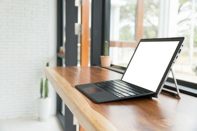 Close-up of laptop on table