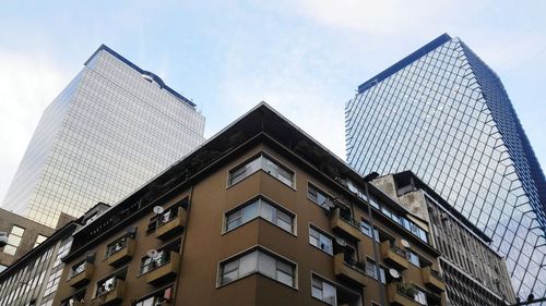 Low angle view of modern building against sky