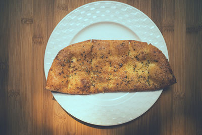 High angle view of bread in plate on table