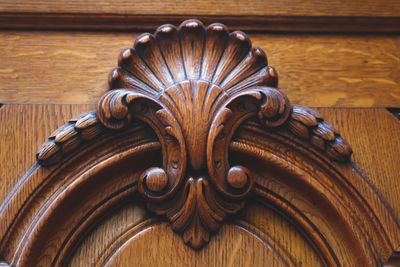 Close-up of carved on wooden door