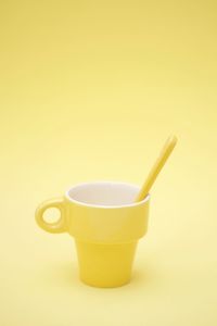 Close-up of tea cup against white background