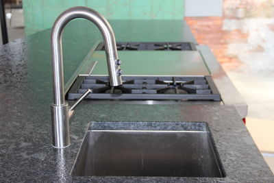 Sink in kitchen at home