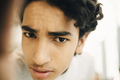 Portrait of teenage boy in restaurant