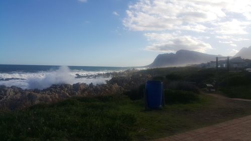 Scenic view of sea against blue sky