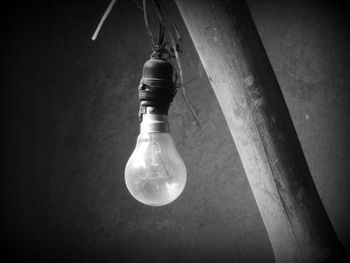 Low angle view of illuminated light bulb