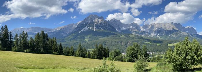 Scenic view of landscape and mountains against sky