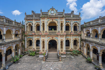 Low angle view of historical building against sky