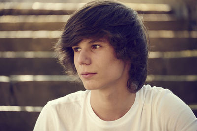 Close-up of young man looking away