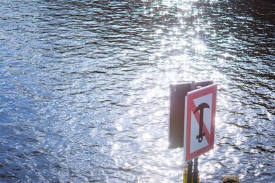 Road sign in water