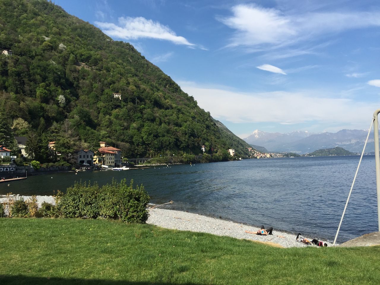 mountain, water, mountain range, sky, scenics, tranquil scene, beauty in nature, tranquility, tree, nature, lake, river, green color, cloud - sky, idyllic, landscape, day, non-urban scene, cloud, grass