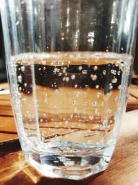 Close-up of drinking glass on table