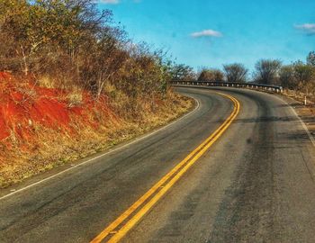 View of country road against sky