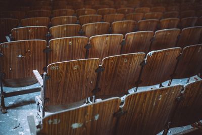 View of chairs in row