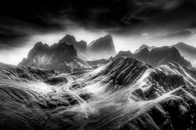 Panoramic view of sea and mountains against sky