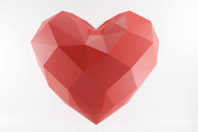 Close-up of heart shape against white background