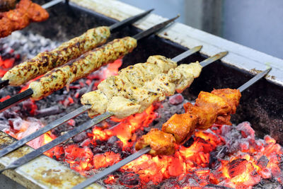 Close-up of meat on barbecue grill