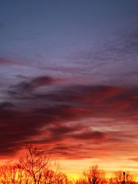 Scenic view of dramatic sky during sunset
