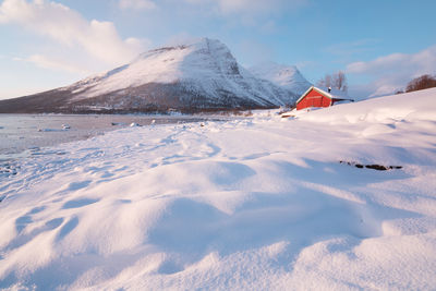 Scenic view of snowcapped mountains against sky