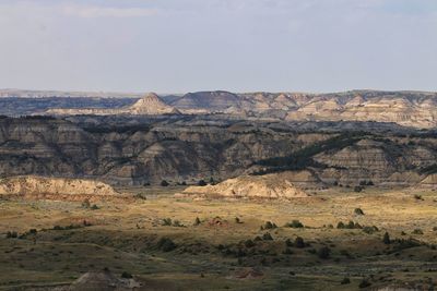 Scenic view of rocky mountains against sky