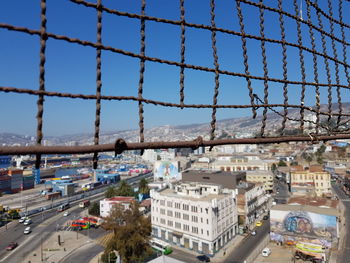 High angle view of city buildings against sky