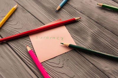 Close-up of colored pencils on table