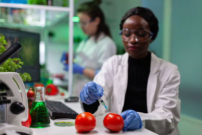 Scientist experimenting at lab