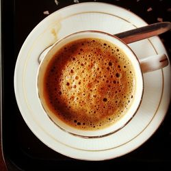 Close-up of coffee cup on table