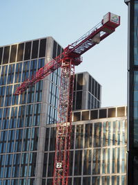 Low angle view of crane at construction site
