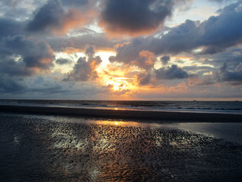 Scenic view of sea against sky during sunset