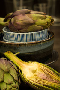 Close-up view of artichokes in plate on table