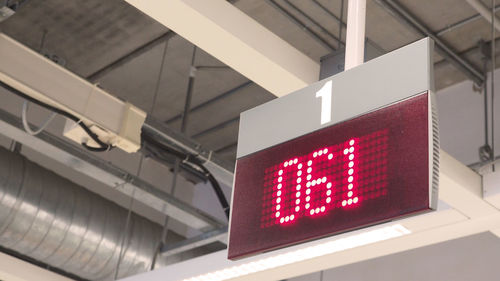 Low angle view of illuminated clock