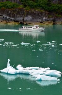 Boat in lake during winter