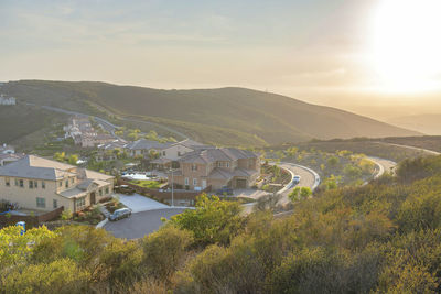 High angle view of residential district against sky