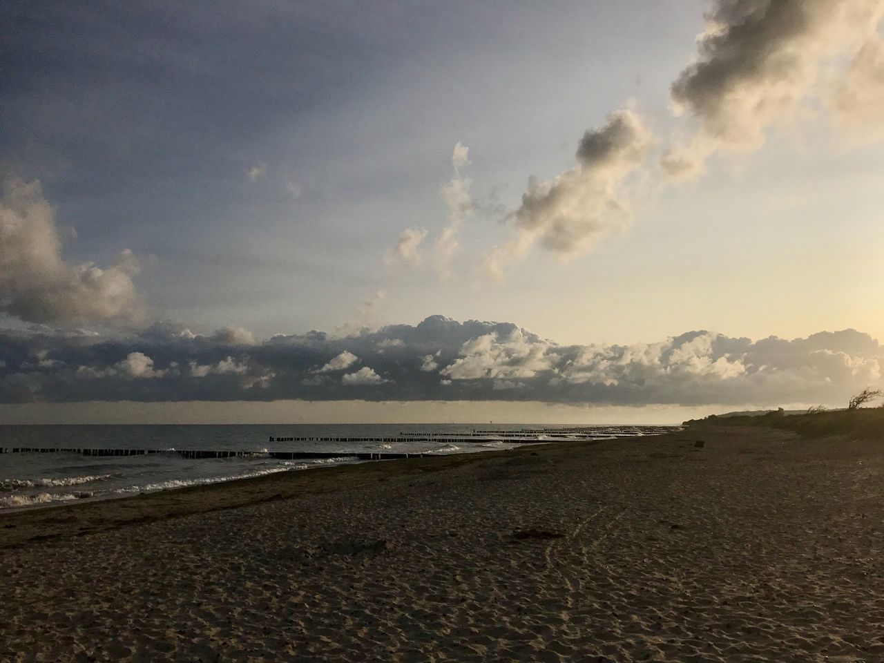 sea, beach, shore, sand, water, nature, sky, tranquility, beauty in nature, scenics, tranquil scene, horizon over water, no people, outdoors, landscape, day