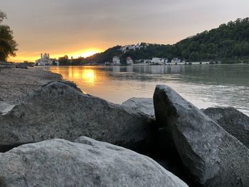 Scenic view of sea against sky at sunset