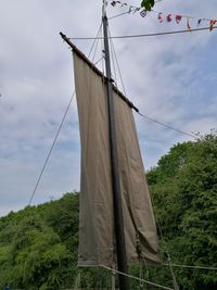 Low angle view of sailboat against sky