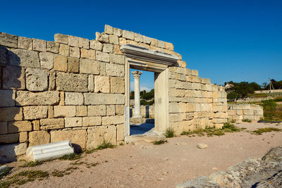 View of old building against blue sky