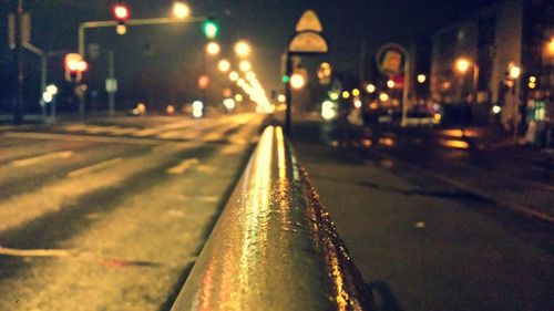 Illuminated street lights at night