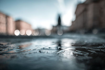 Surface level of wet footpath in city