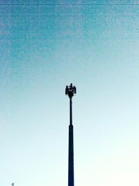 Low angle view of street light against clear sky