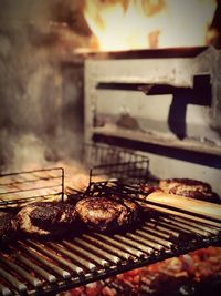 Close-up of meat on barbecue grill