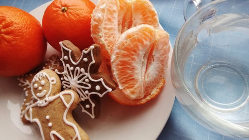 High angle view of fruits in plate on table