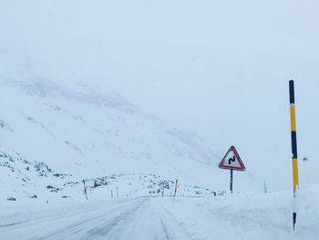 View of road against clear sky during winter