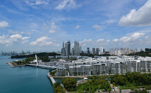 Modern buildings in city against sky