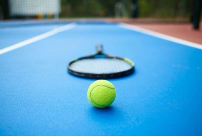 Close-up of green ball on table