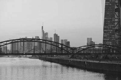 View of bridge over river in city