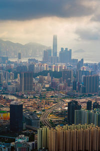 High angle view of buildings in city against sky