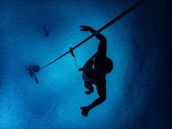 Man swimming in sea