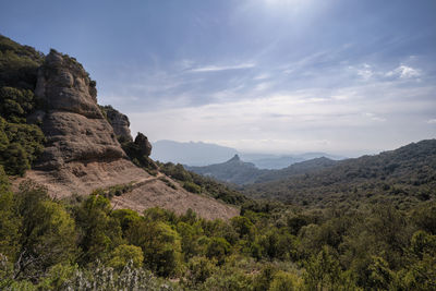 Scenic view of rocky mountains against sky