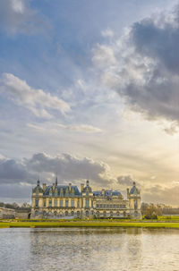 View of historical building against cloudy sky